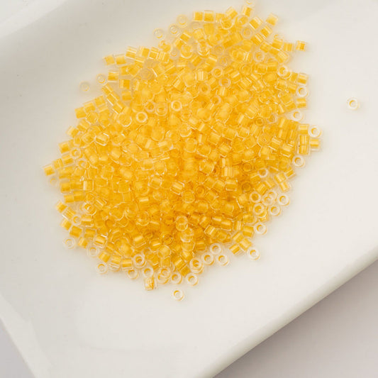 Cylin Bead 11/0 Glow in Dark Gold Yellow