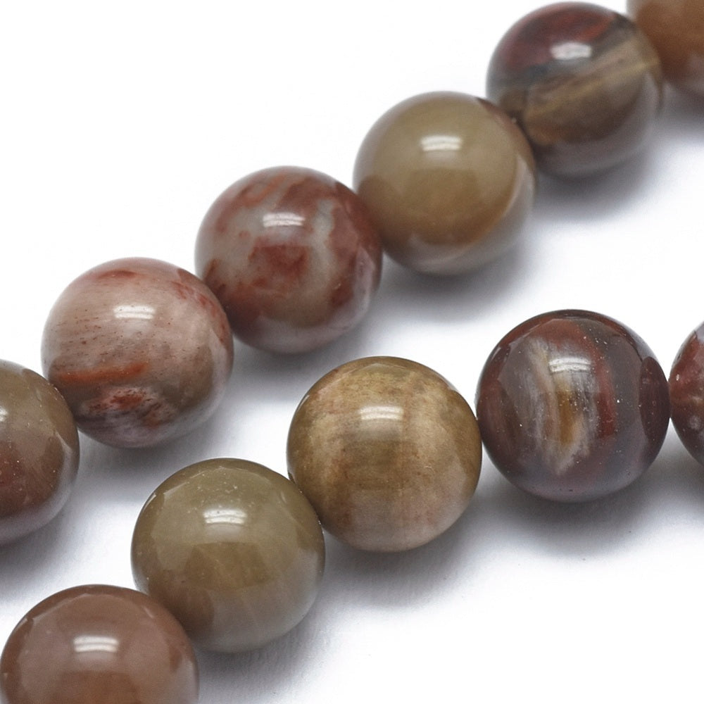 Perle ronde en bois pétrifié