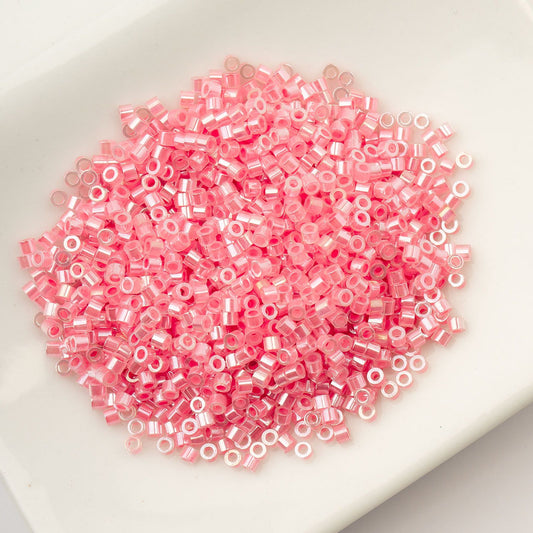 Cylin Bead 11/0 Crystal Rose Lined Ceylon