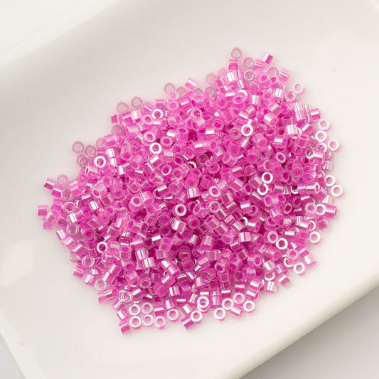 Cylin Bead 11/0 Crystal Fuchsia Lined Ceylon