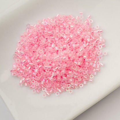 Cylin Bead 11/0 Glow in Dark AB Pink