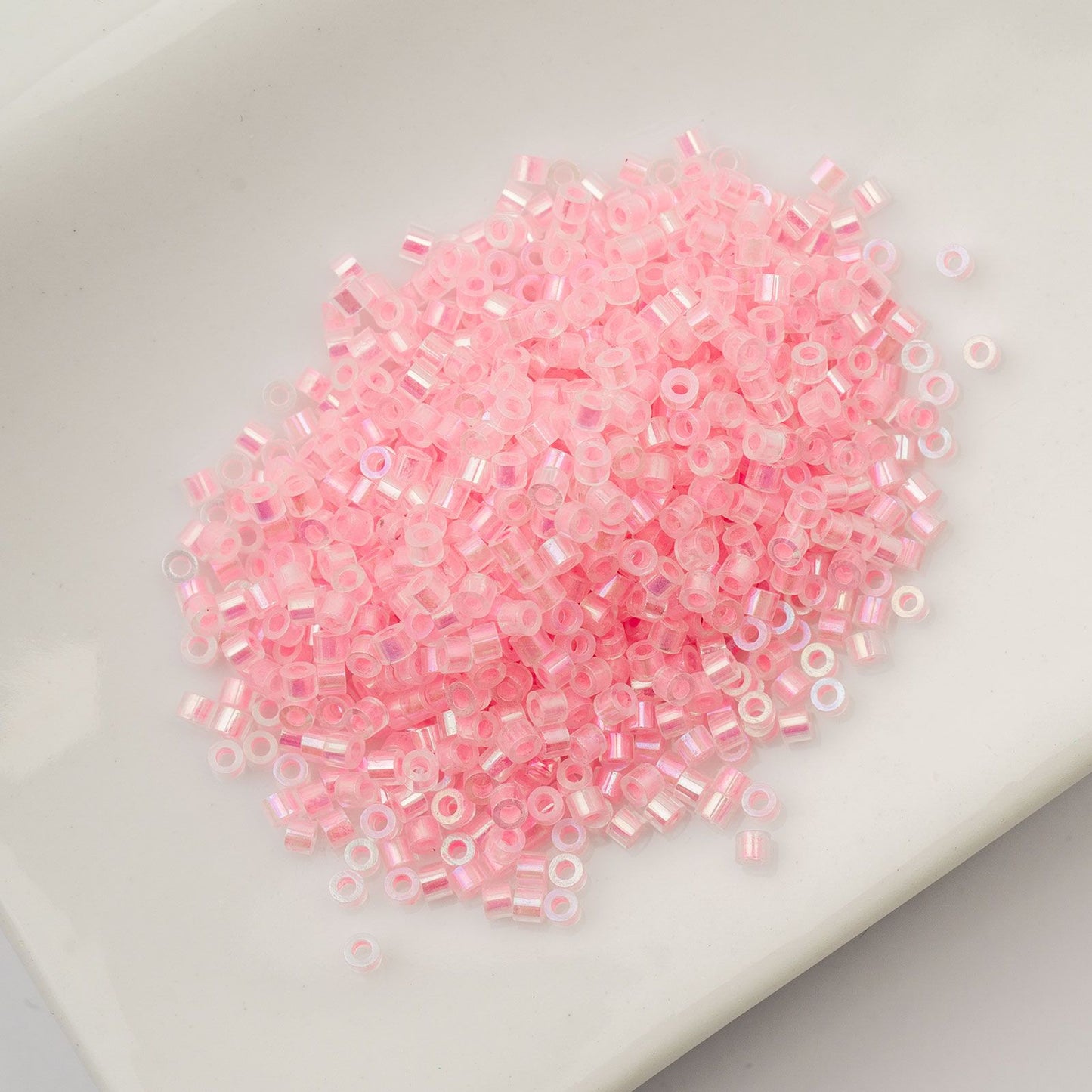 Cylin Bead 11/0 Glow in Dark AB Pink Neon