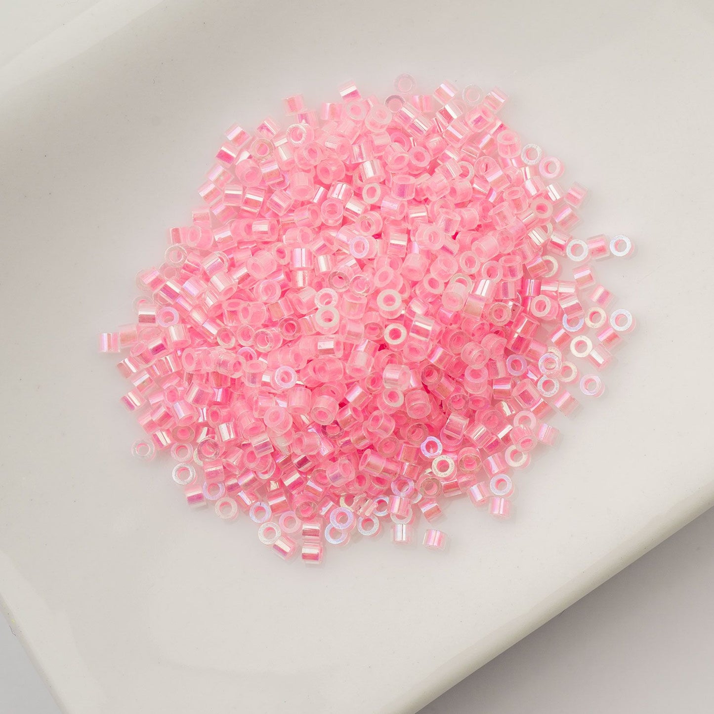 Cylin Bead 11/0 Glow in Dark AB Rose