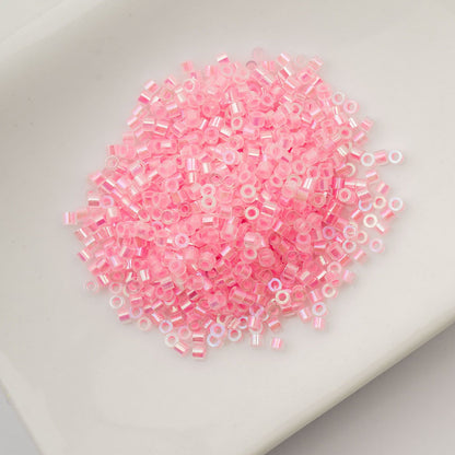 Cylin Bead 11/0 Glow in Dark AB Rose