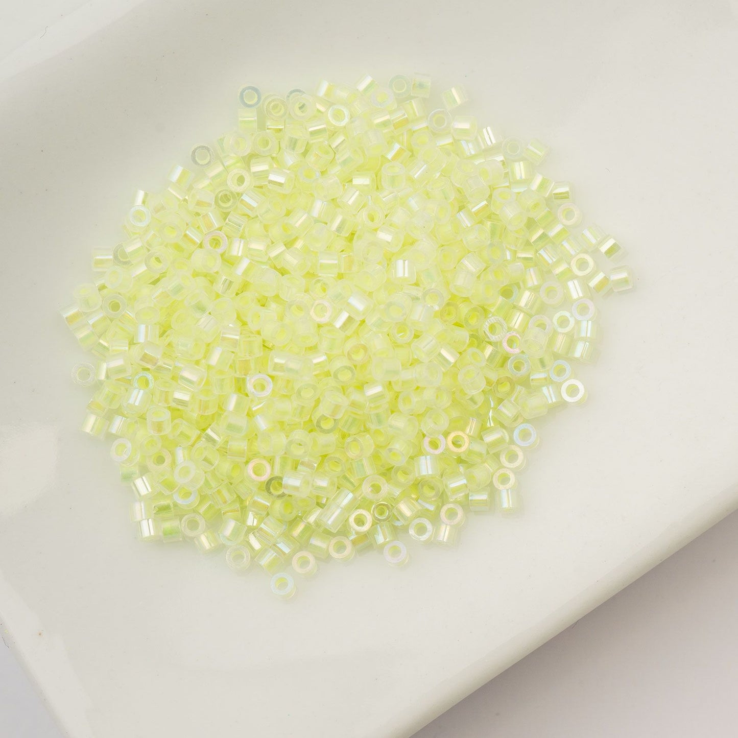 Cylin Bead 11/0 Glow in Dark AB Yellow Neon