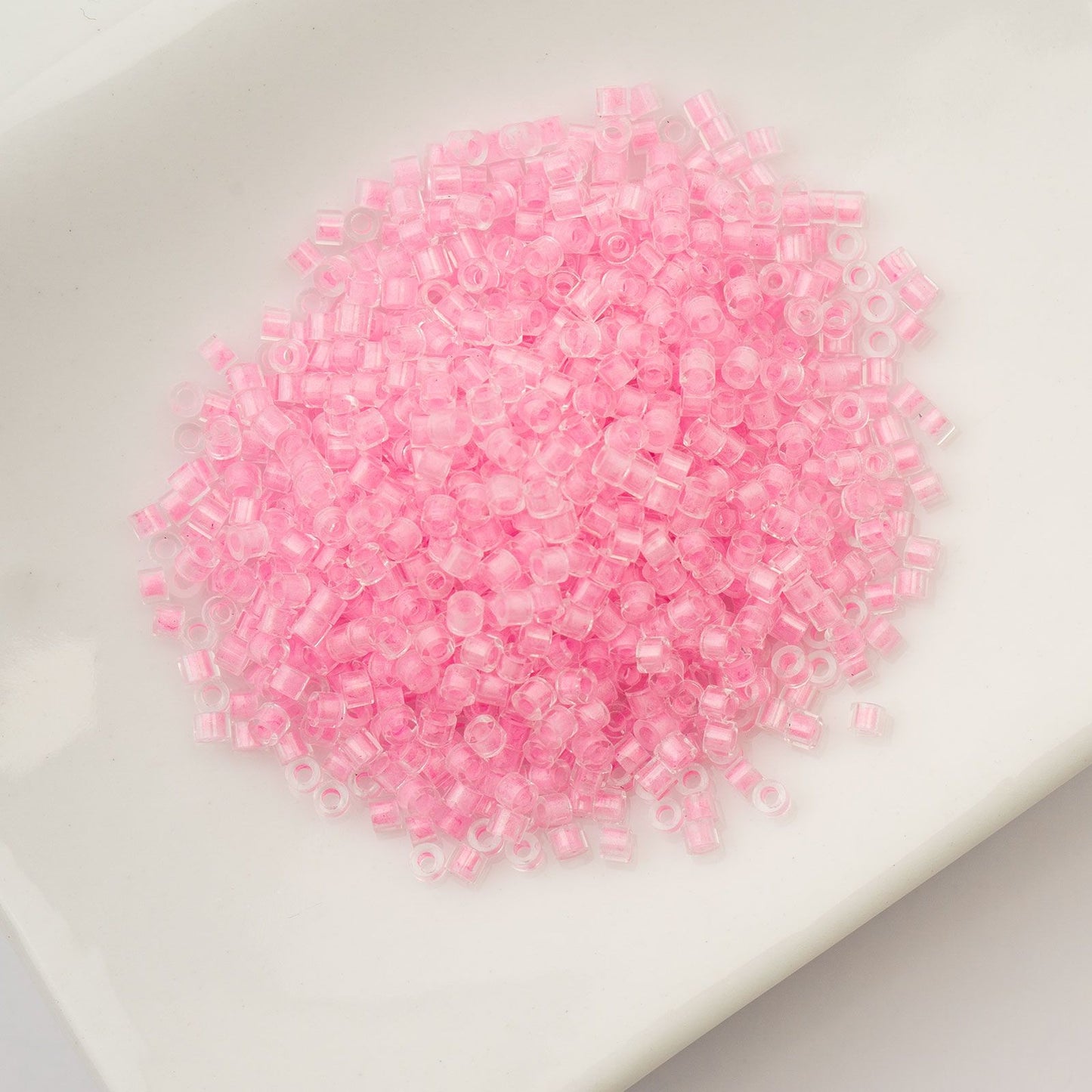 Cylin Bead 11/0 Glow in Dark Pink