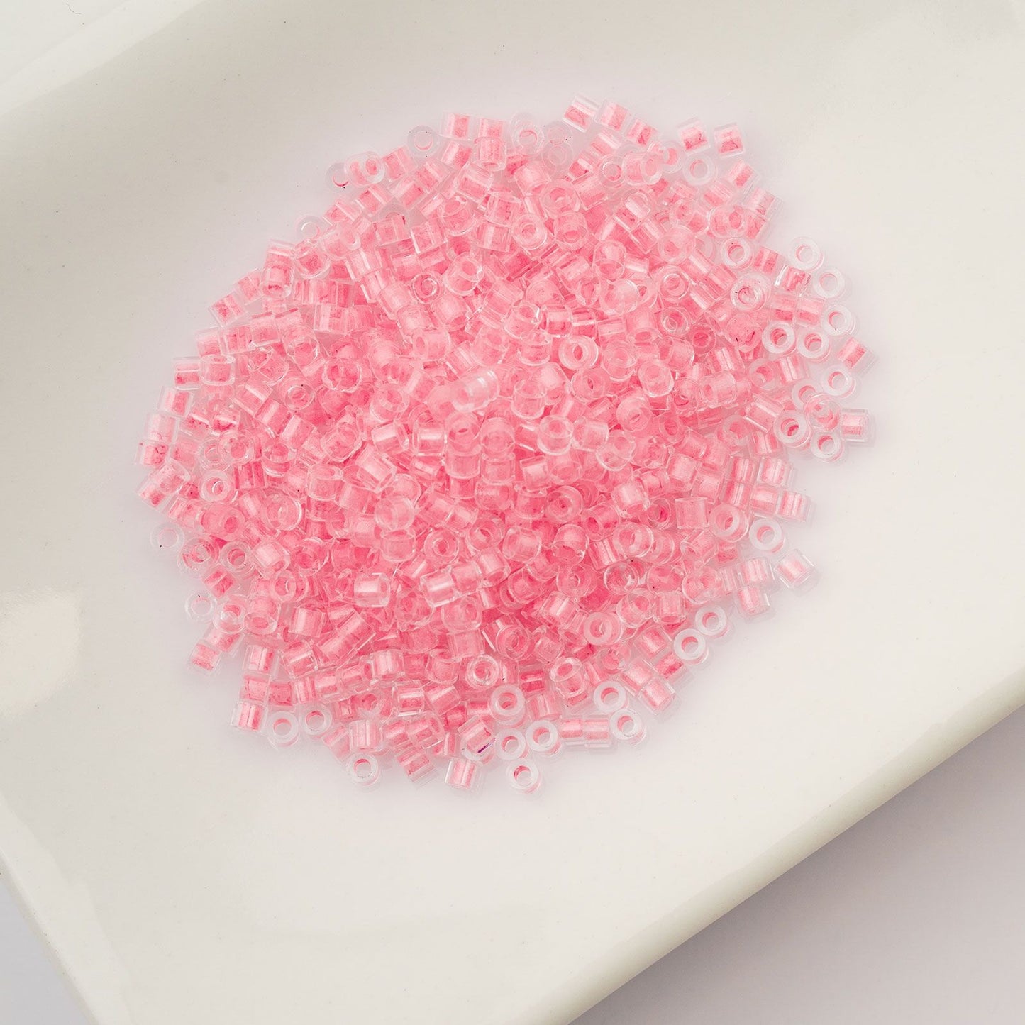 Cylin Bead 11/0 Glow in Dark Pink Neon