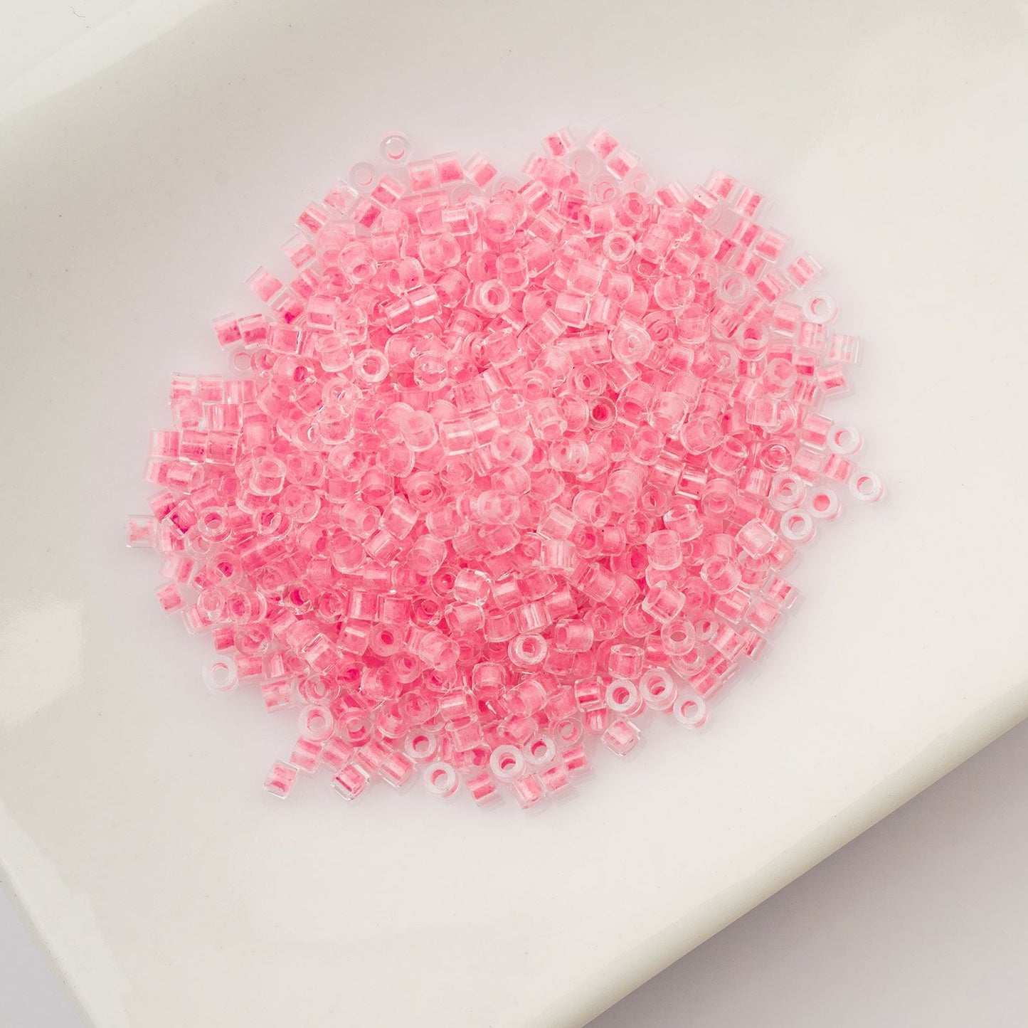 Cylin Bead 11/0 Glow in Dark Rose