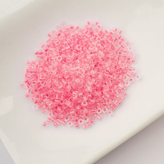 Cylin Bead 11/0 Glow in Dark Rose