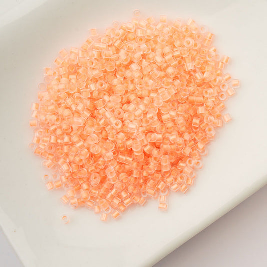 Cylin Bead 11/0 Glow in Dark Orange