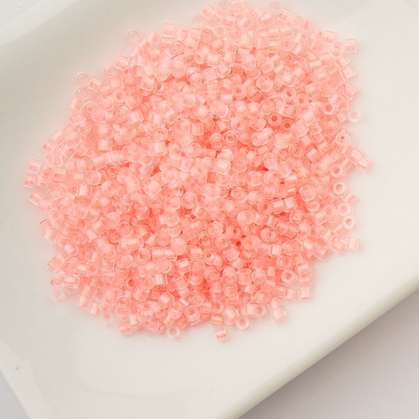 Cylin Bead 11/0 Glow in Dark Coral