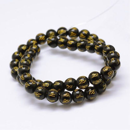 Black Agate Carved Om Mani Padme Hum Gemstone Bead | Alberta Bead Store